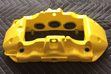 Safety yellow brake caliper